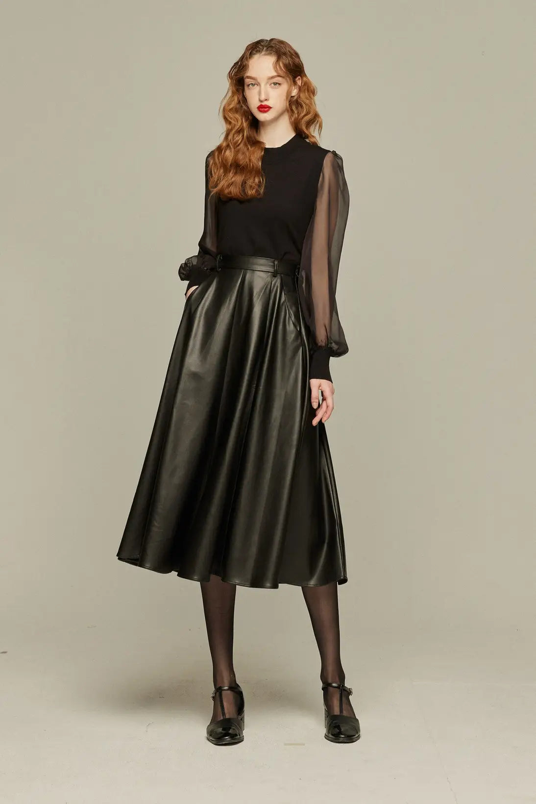 《열흘에 한 번은 머리를 잘라》 가짜 가죽 하이 웨스트 플레어 스커트-Black
